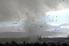 Debris flies through the air during a freak tornado