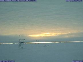 The NOAA North Pole webcam shows the sun low in the sky just before the fall equinox.