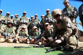 Coalition forces (including U.S. military) train Iraq's Kurdish Peshmergas. Regardless of personal feelings, U.S. military personnel are not allowed to denigrate the president or Congress.