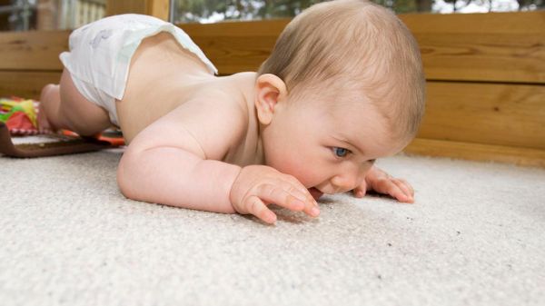 baby on carpet