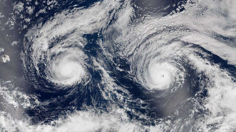 This August 29, 2016 image shows Hurricanes Madeline and Lester in the Pacific Ocean near Hawaii. NASA Earth Observatory/Jesse Allen