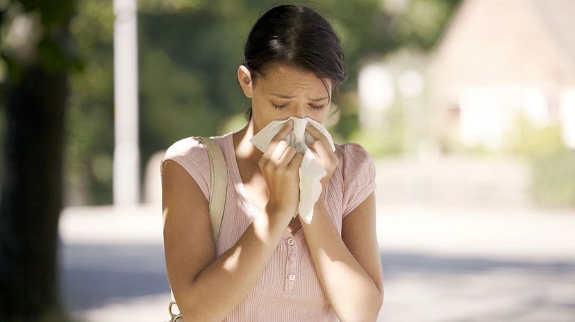 Seasonal allergies can flare up when you relocate and are exposed to new allergens. Martin Leigh/Getty