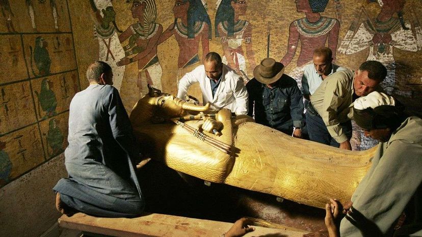 Researchers opening King Tutankhamen's sarcophagus in 2007 to study the Egyptian pharoah's mummy. Ben Curtis/AFP/Getty Images