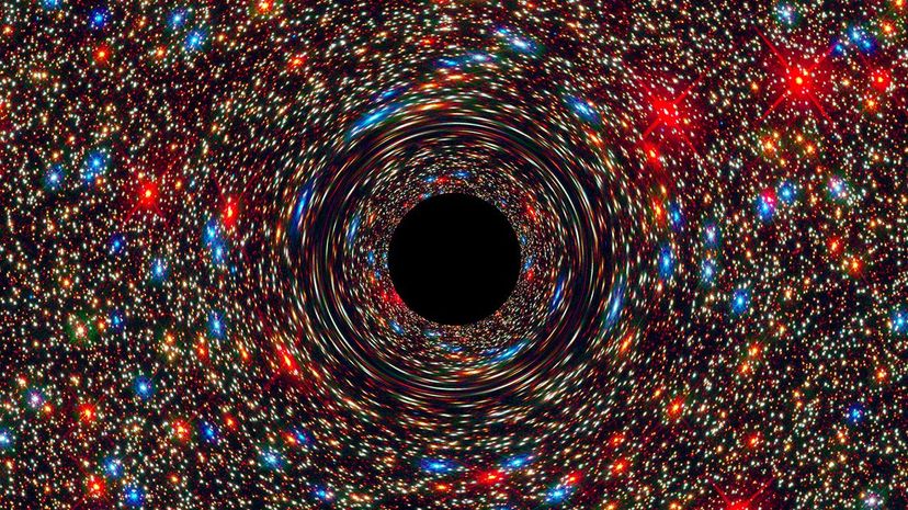 This image of a supermassive black hole is computer-simulated. By the end of 2017, the Event Horizon Telescope is aiming to show the world, for the first time, the bright ring of a black hole's event horizon. NASA, ESA, and D. Coe, J. Anderson, and R. van der Marel (STScI)