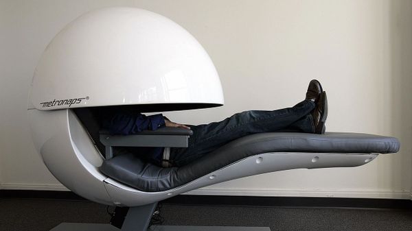 person in napping pod