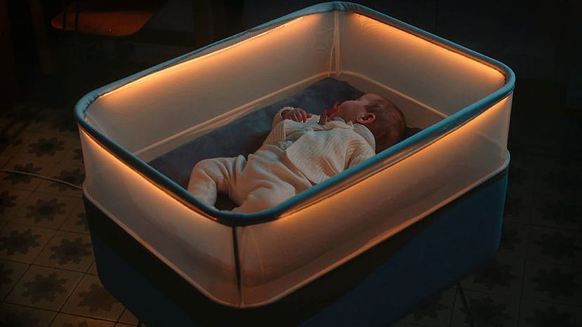 Ford's new concept crib is designed to mimic the sounds, lights and movements of a car ride, lulling newborns to sleep. Max Motor Dreams