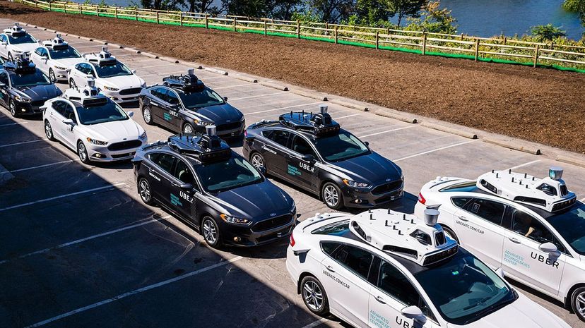 A fleet of Uber self-driving cars hangs out at the Uber Advanced Technologies Center in Pittsburgh, Pennsylvania. One of the Uber self-driving fleet was involved in an accident on March 24, 2017, thought to be caused by human error. ANGELO MERENDINO/AFP/Getty Images