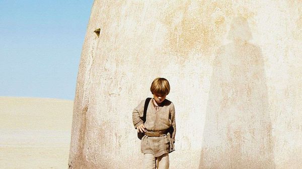 Young Anakin Skywalker with Darth vader shadow
