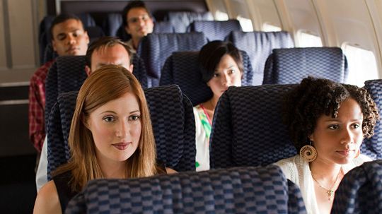 Yes, Airlines Are Shrinking Space Between Your Face and the Next Seat Up