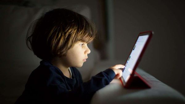 child looking at screen