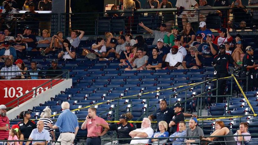 Police block off a section with police tape after a fan fell from the upper deck of Turner Field in the seventh inning during the game between the Atlanta Braves and the New York Yankees on Aug. 29, 2015. Mike Zarrilli/Getty Images