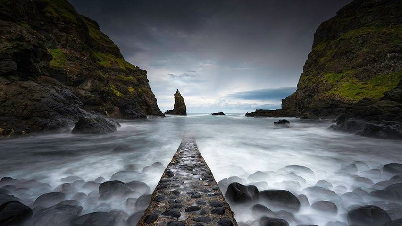 The ruins of a jetty at Port Coon in Ulster, Northern Ireland, near the mysterious geological formation known as the Giant's Causeway. Daniel Bosma/Getty Images