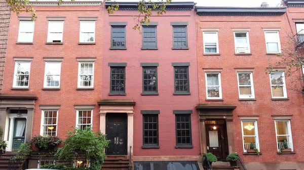 Modern built structure with grand windows.