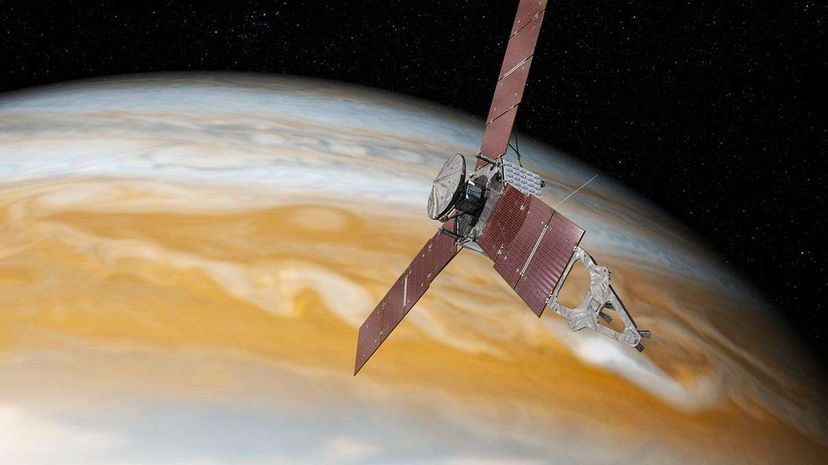 An artist's rendering of the Juno spacecraft with Jupiter in the background. NASA/JPL-Caltech