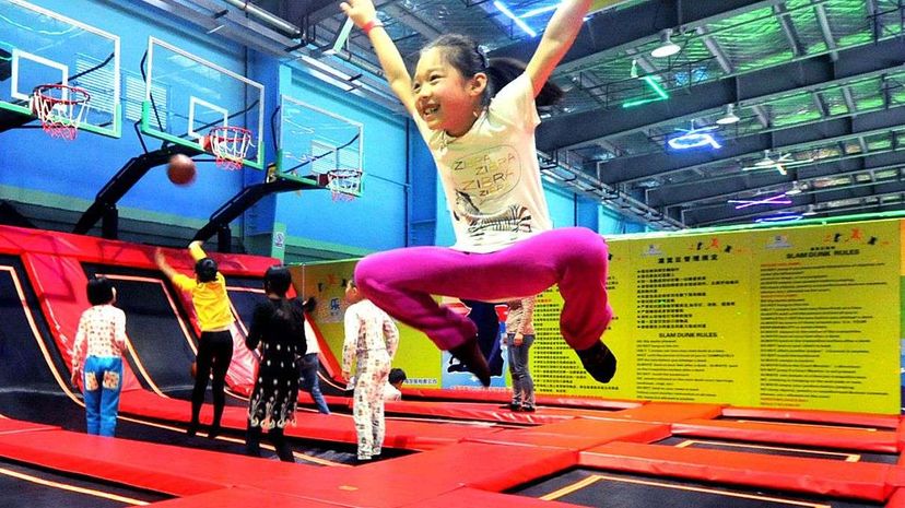 A little girl jumps for joy at China's largest trampoline park in Shanghai. A new study highlighted the severity of injuries sustained at these parks. VCG/VCG via Getty Images