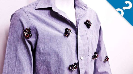 Rovables: Tiny Robots That Roll on Your Clothes All Day