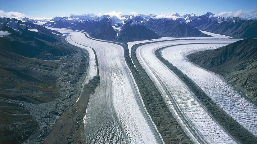 An aerial view of Kaskawulsh Glacier in Kluane National Park, Yukon, Canada. The UNESCO World Heritage site is undergoing rapid changes attributable to an altered climate. DEA/F. Barbagallo/De Agostini/Getty Images