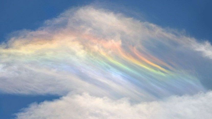 A circumhorizontal arc happens when sunlight refracts through ice crystals in cirrus clouds. HeatherNemec/GettyImages