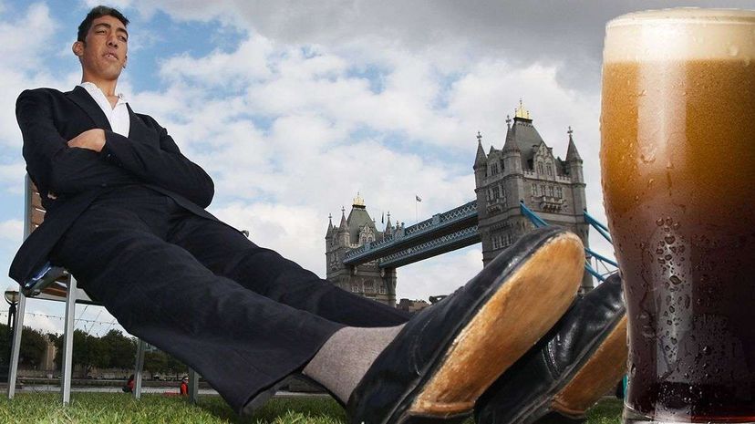 The world's tallest living man, Sultan Kosen, poses in London in 2010 for a Guinness World Records ceremony. Dan Kitwood/Lee Rogers/Getty Images