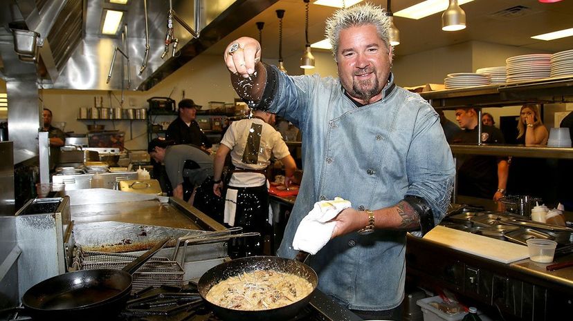 Chef and TV personality Guy Fieri, one of many who show up in a new study on food safety, cooks at his restaurant Guy Fieri's Mt. Pocono Kitchen at Mount Airy Casino Resort. Paul Zimmerman/Getty Images
