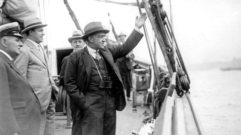 September 1921: Sir Ernest Shackleton waves goodbye as he embarks on the Shackleton-Rault Expedition to the Antarctic. The famous explorer would die the following year at age 47. Topical Press Agency/Getty Images