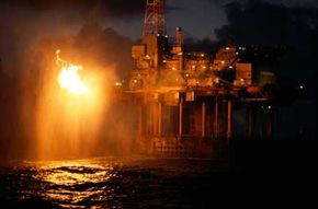 Offshore drilling platforms burn off excess natural gas, giving them their signature flares.