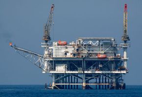 Offshore rigs like this one are the source of many heated discussions. See more pictures of oil fields and drilling.