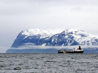 Oil tanker moves through Alaska's Prince William Sound. 