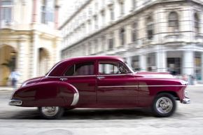 A maroon vintage car in Havana, Cuba.