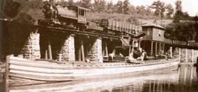 This photograph shows coal being dumped from railroad cars into a waiting canal boat. For transporting minerals, water was still the least expensive option.