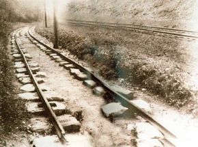 This bypassed section of the Camden & Amboy Railroad in New Jersey survived as an example of early 1830s railroad track. Like English iron rails of the time, they were supported by stone blocks, which made a sturdy but expensive railroad.