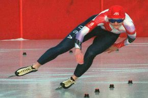 United States speed skater Bonnie Blair glides around a curve during the women's 1000 meters at the Albertville Olympics on her way to a gold medal.