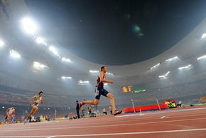 A sprinter is seen on his way to win the men's 400m final. See more Olympic pictures.