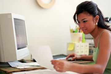 Woman working at computer. 