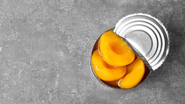 open can of peaches