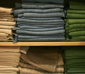 Violence-free silk scarves are displayed on a shelf at OrganicAvenue, a vegan general store in New York.See green living images.