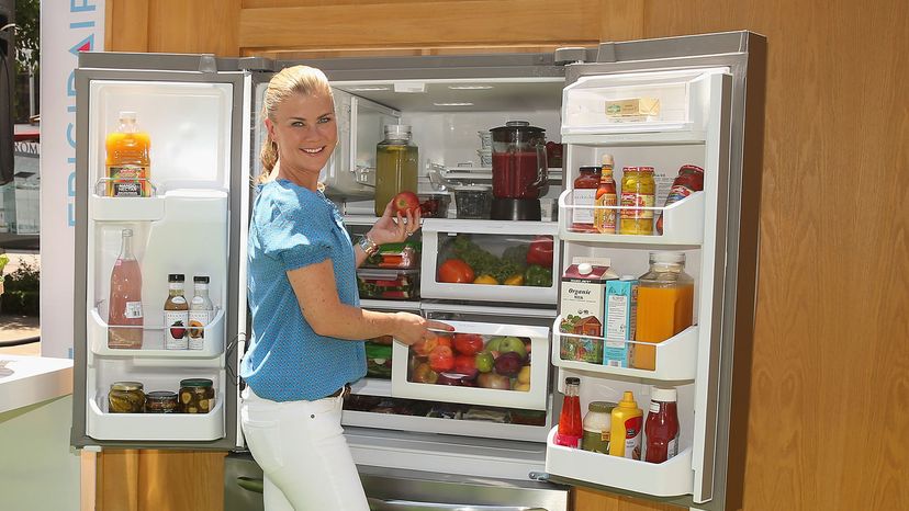 Allison Sweeney show off the Frigidaire Gallery french door refrigerator