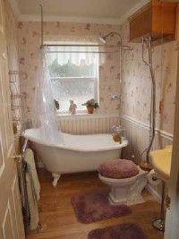 A small bathroom with a clawfoot tub and a cozy ambience.&nbsp;