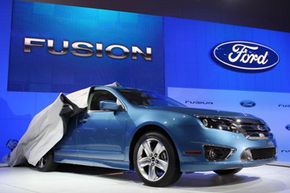 Ford unveiled its 700 city miles per tank Fusion hybrid car at the Los Angeles Auto Show on Nov. 19, 2008 in Los Angeles, Calif.