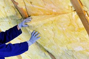 当安装矿棉,用更高的热阻比你认为你需要弥补的损失随着时间的推移会发生。”width=