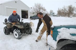ATV winch pulling a truck