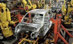 Car frame passing on assembly line