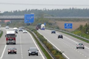 Vehicles drive on the German highway A20 from Luebeck to Stettin, near Rostock, northern Germany.
