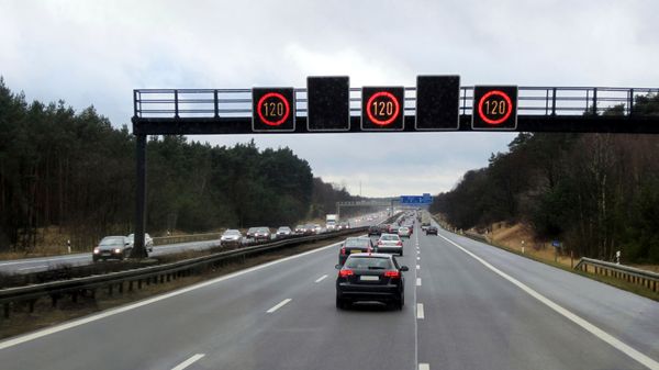 Vehicles drive on the German highway autobahn.