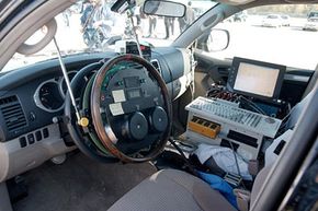 Vehicles being tested in the U.S. Department of Transportation's National Highway Traffic Safety Administration's new dynamic rollover test are controlled by computer for accuracy, as is demonstrated in this 2003 Toyota 4Runner.