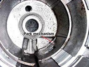 Figure 2. The empty housing of the transmission with the parking brake mechanism poking through, as it does when the car is in park.