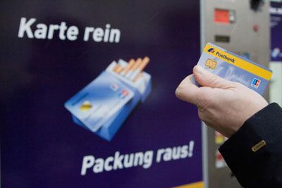 Cigarette machine accepts credit cards