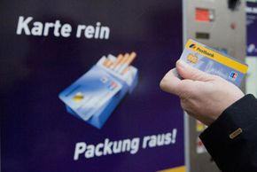 As of Jan. 1, 2007, Germans could use their credit cards for cigarettes from vending machines. See more debt pictures.