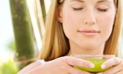 woman drinking green tea photo