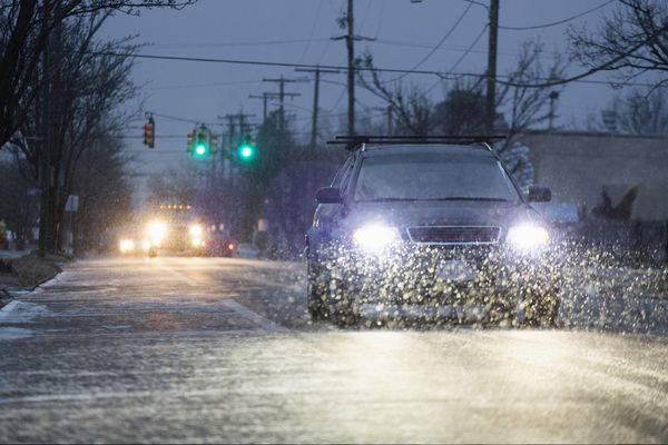 car driving at night in snow